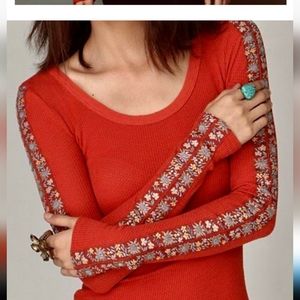 Heart on sleeve orange cuff thermal